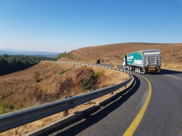 Truck driving in a asphalt road